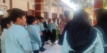 Polda NTB Tanamkan Kesadaran Kamtibmas Sejak Dini kepada Siswa SDN 4 Bajur